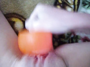 My sister with a shaved pussy satisfies herself with a rubber dildo