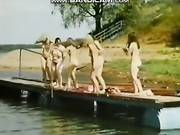 Catherine Kmit and a bunch of unknown naked girls