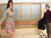 A gorgeous Japanese whore with real milkings fucks with a man.