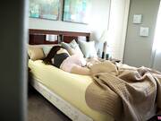 A bald man penetrated into the house fucks a young brunette in bed