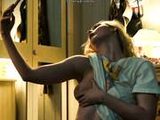 A blonde beauty shows off her tits for an erotic chat in a new series.