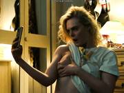 A blonde beauty shows off her tits for an erotic chat in a new series.